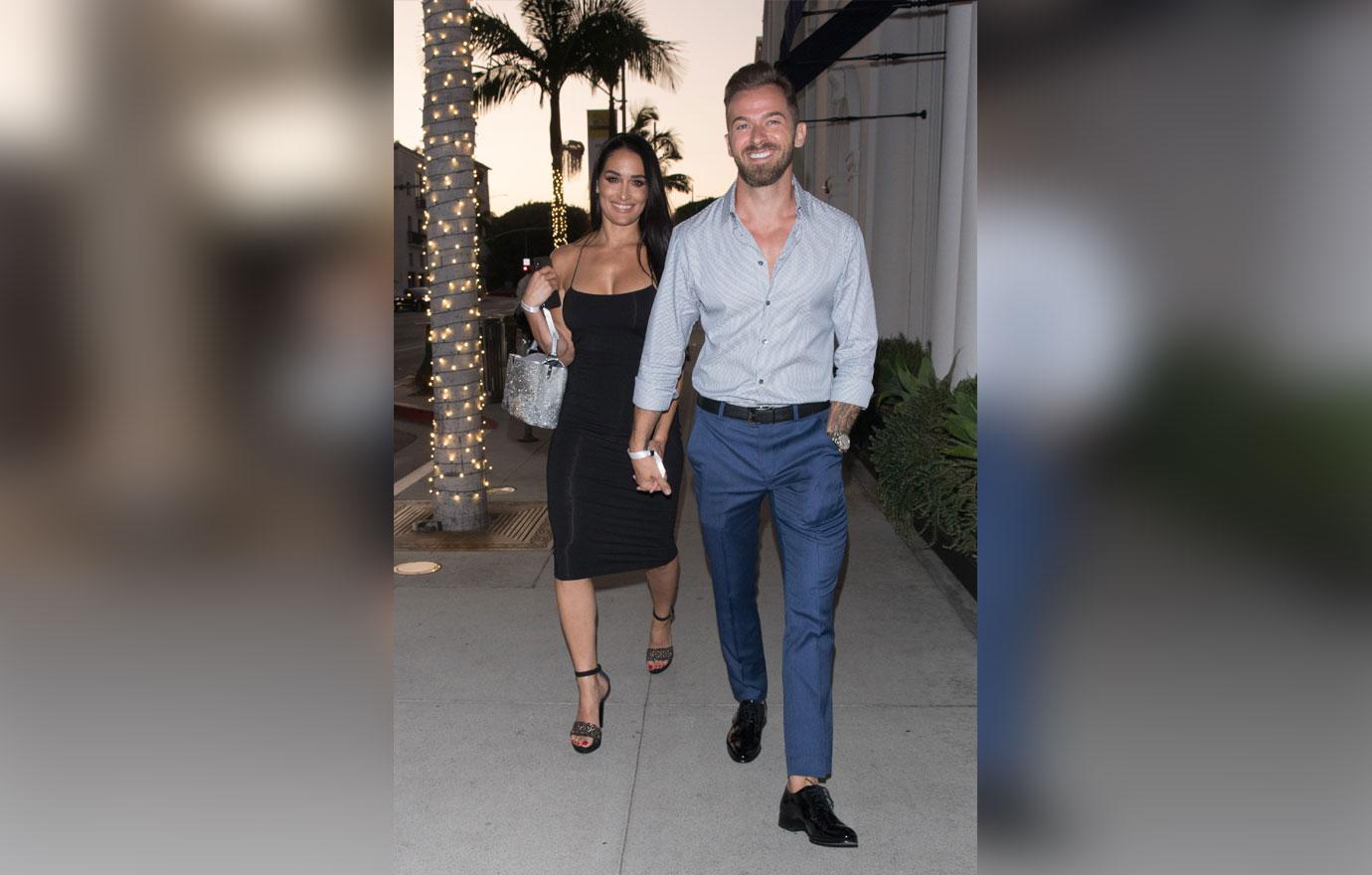 Nikki Bella & Artem Chigvintsev Look Smitten Leaving A Party In LA