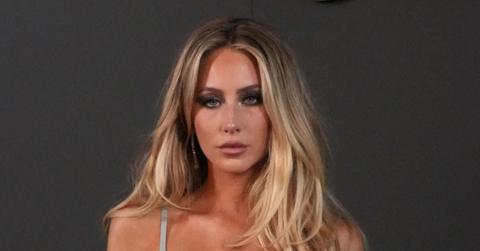 alix earle shrugs off having a nip slip in hilarious exchange