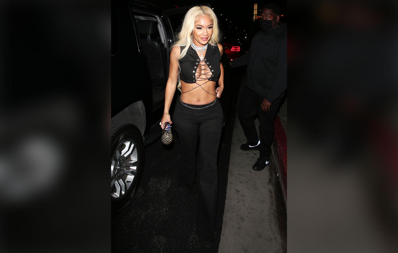 saweetie shows off her toned stomach ok