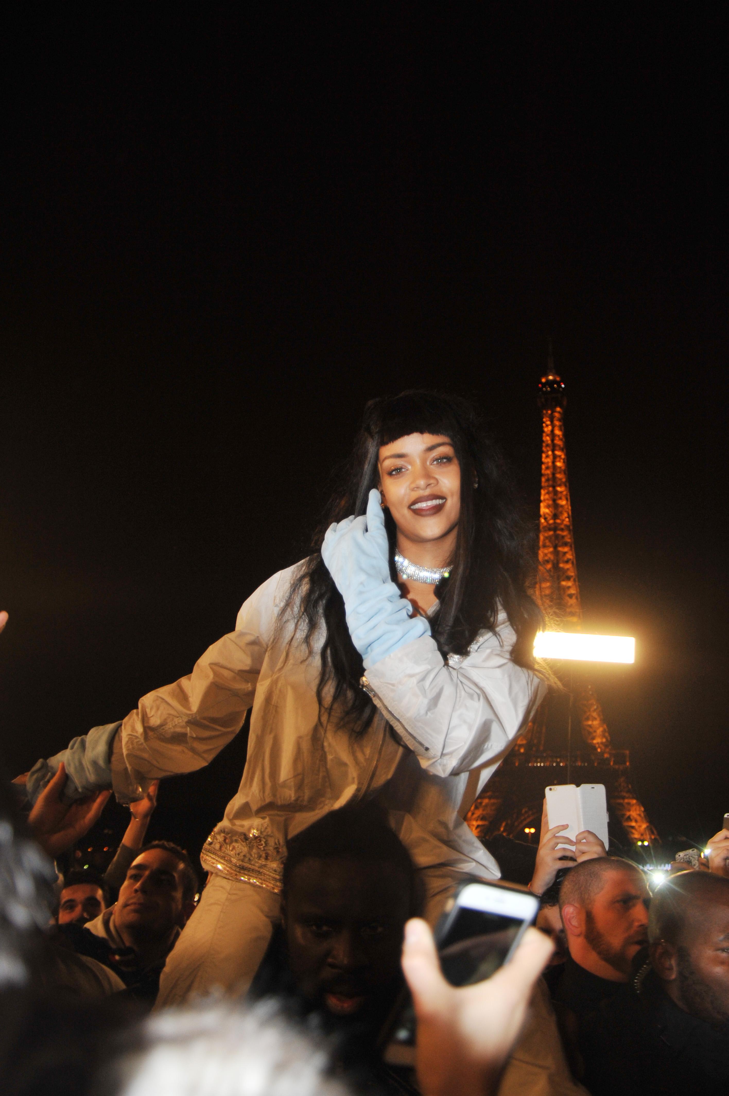 Rihanna shoots footage with her fans around the Eiffel Tower in Paris