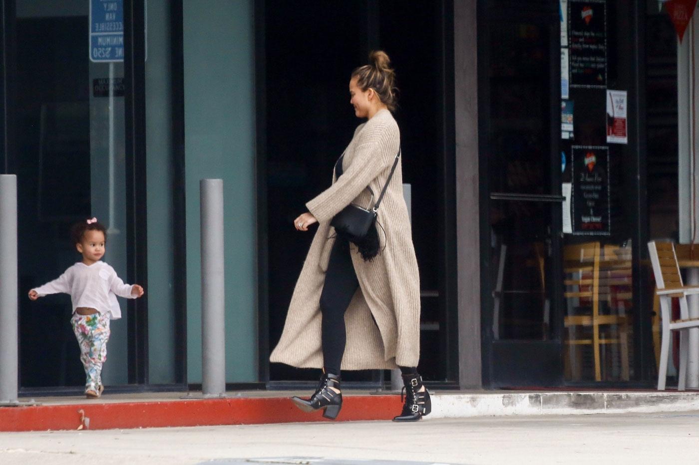 *EXCLUSIVE* Chrissy Teigen and John Legend shop at PC Greens with a cranky Luna