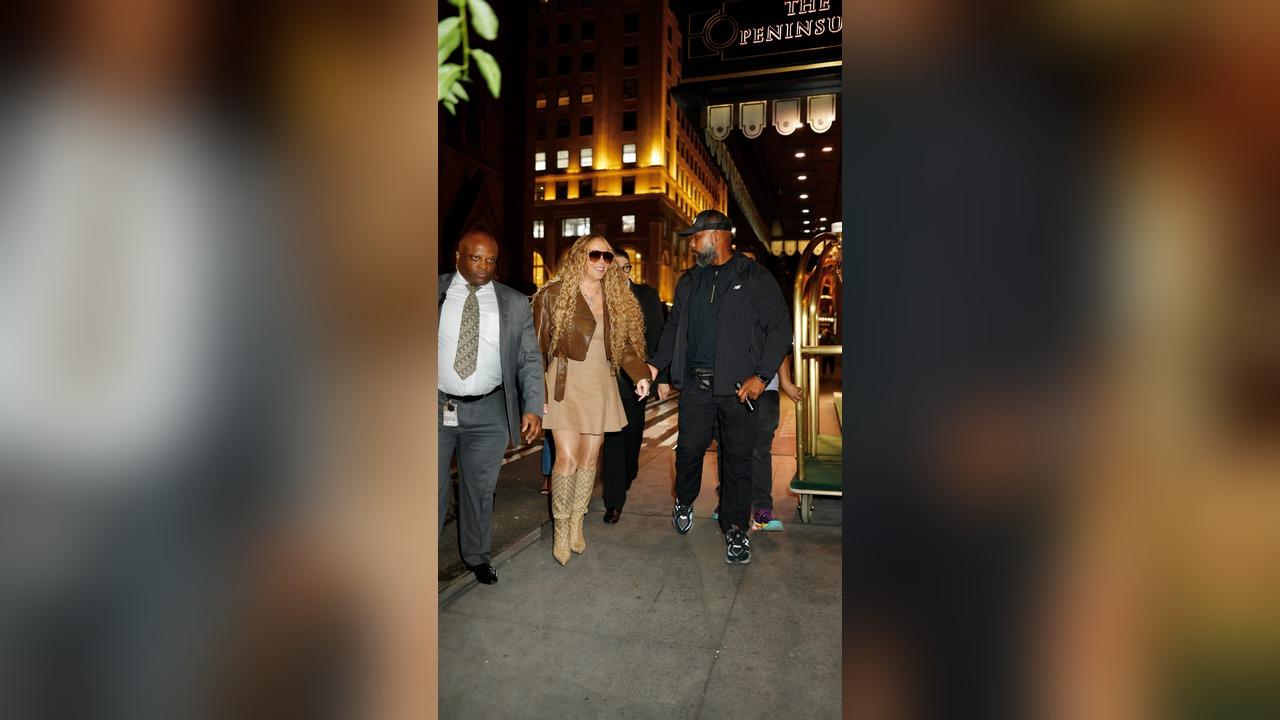 Image of The "We Belong Together" singer was spotted making her way out of Il Tinello restaurant in Manhattan.