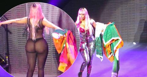 Nicky Minaj Holds Irish Flags While Showing Off Her Large Posterior In Fishnet Bodysuit, In Dublin, Ireland!
