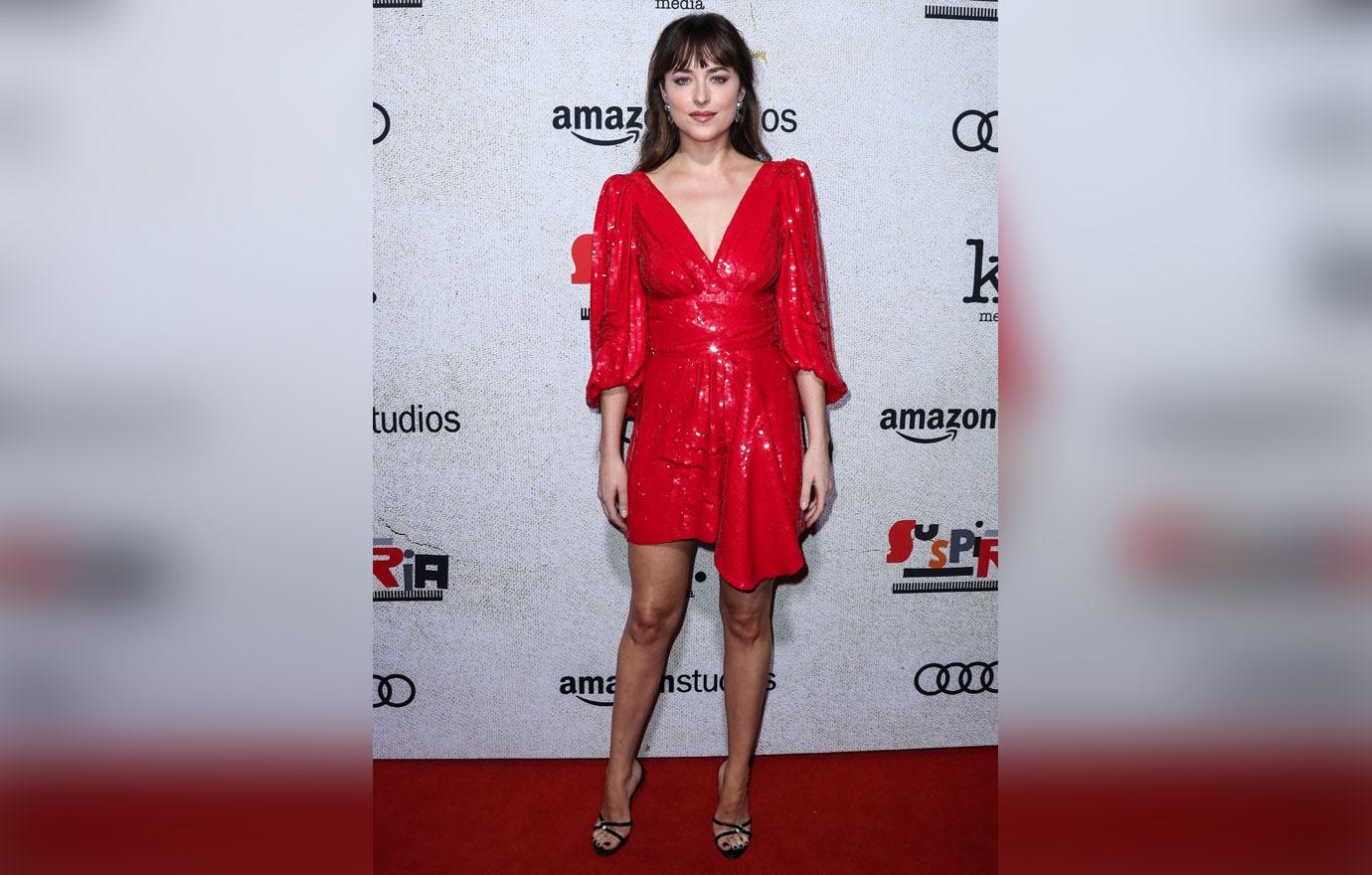 Dakota Johnson wearing a Celine dress, Sophie Buhai earrings, and Giuseppe Zanotti heels arrives at the Los Angeles Premiere Of Amazon Studio&#8217;s &#8216;Suspiria&#8217;