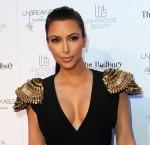 2011__04__Kim_Kardashian_April11newsnea 150×145.jpg