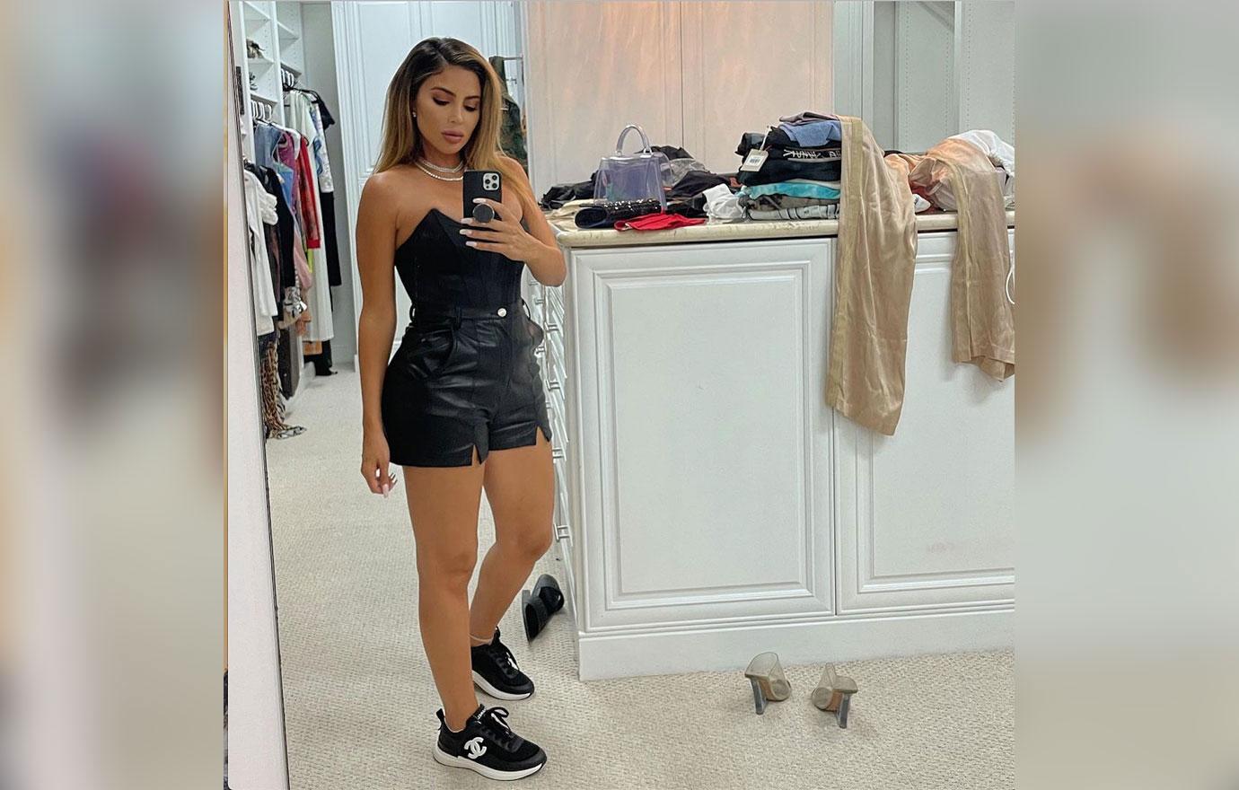 Larsa Pippen shows off her curvy figure in a black bodysuit during