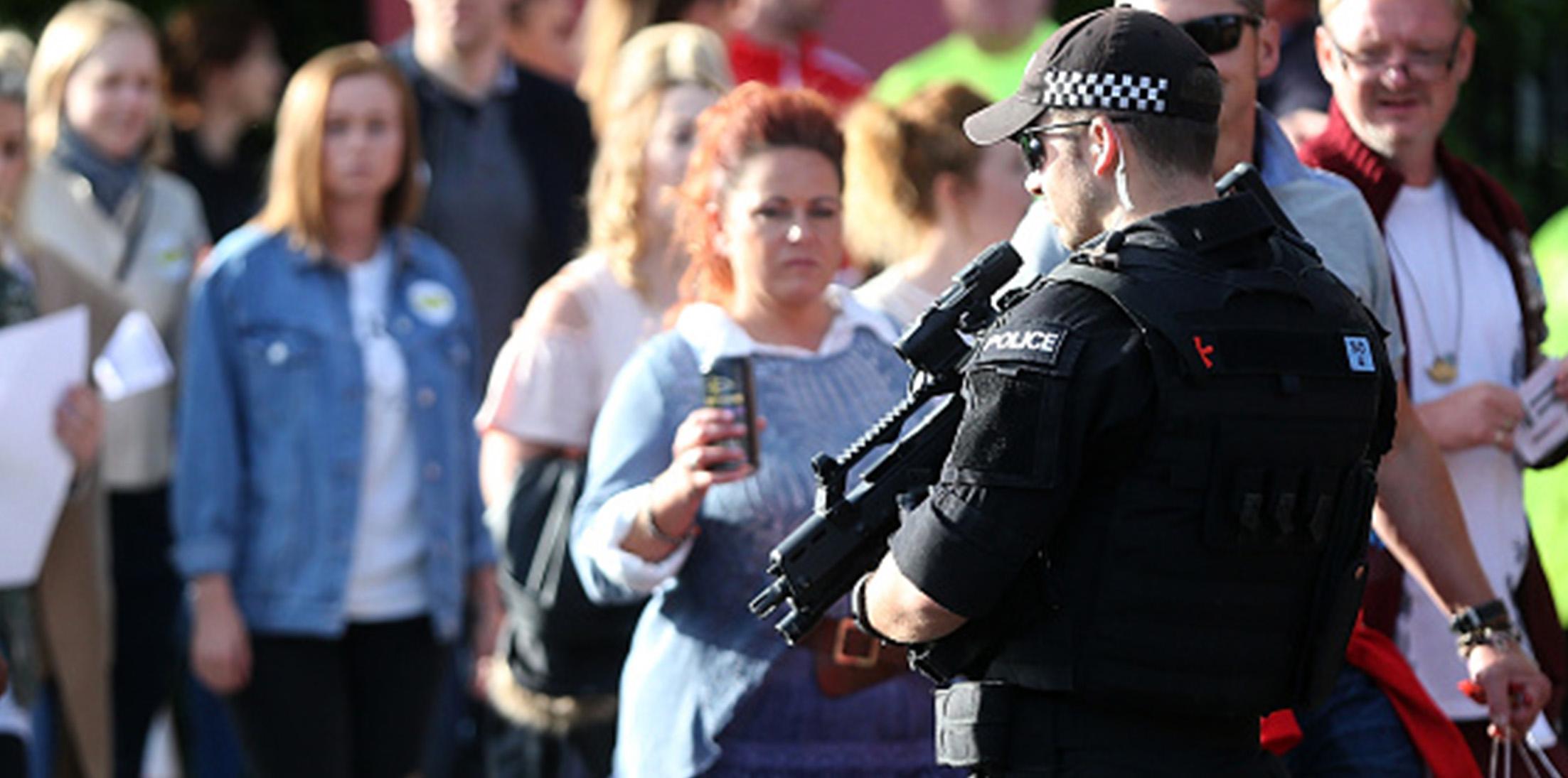 Ariana grande police security manchester benefit concert feature