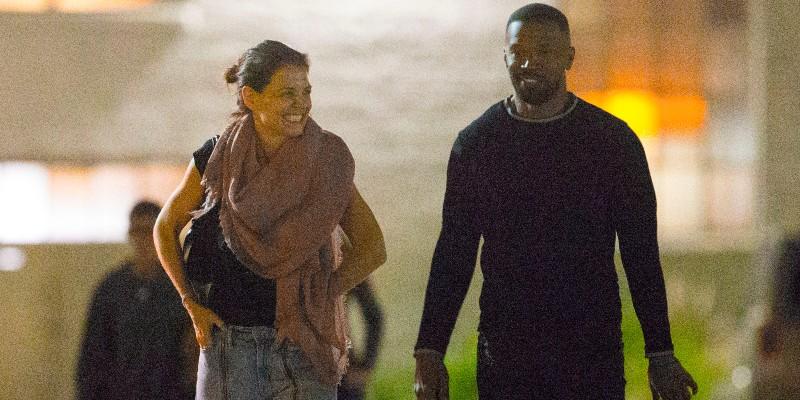 Katie Holmes and Jamie Foxx have a blast on the beach.