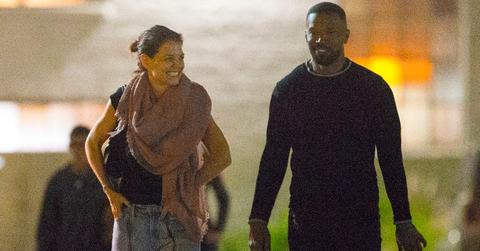Katie Holmes and Jamie Foxx have a blast on the beach.