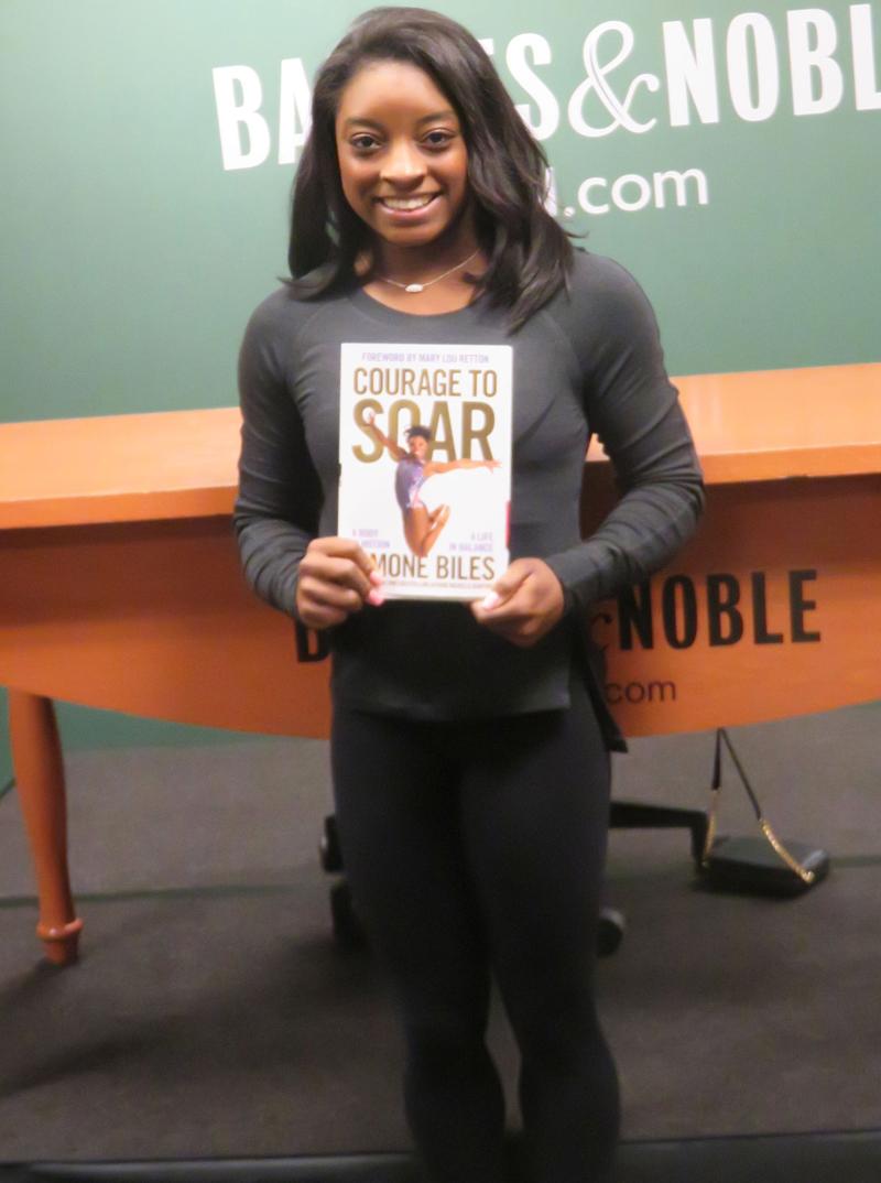 simone biles childhood tell all book secrets