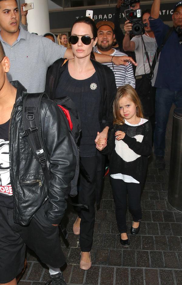 Brad pitt angelina jolie kids travelling airport