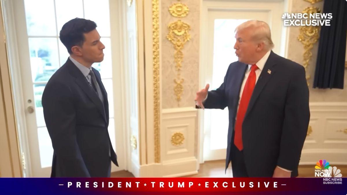 Photo of Donald Trump makes 'cutting motions' when talking about Jeffrey Epstein to show he's done talking about the scandal, a body language expert shared.