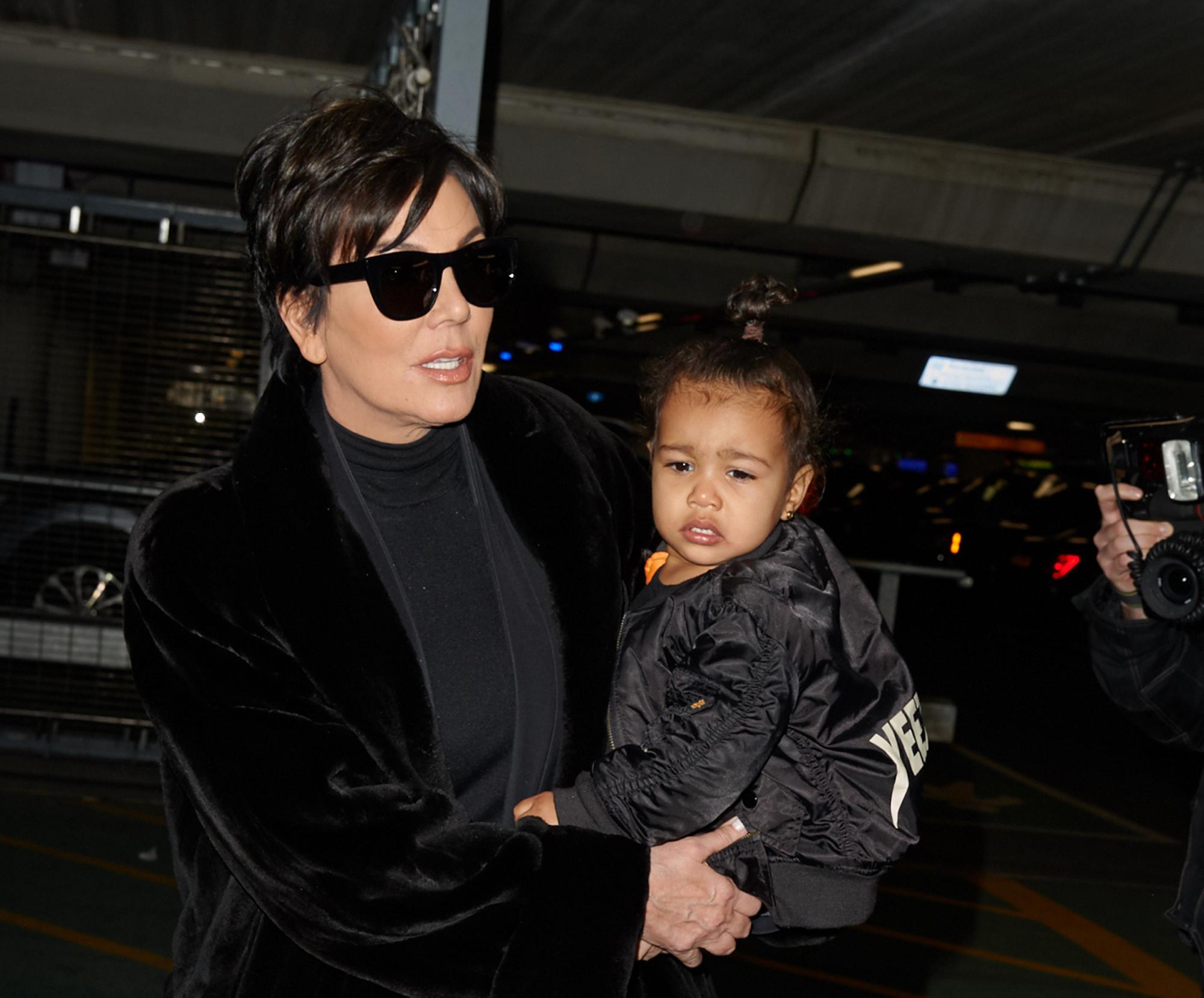 Kris Jenner and baby North West at Heathrow Airport