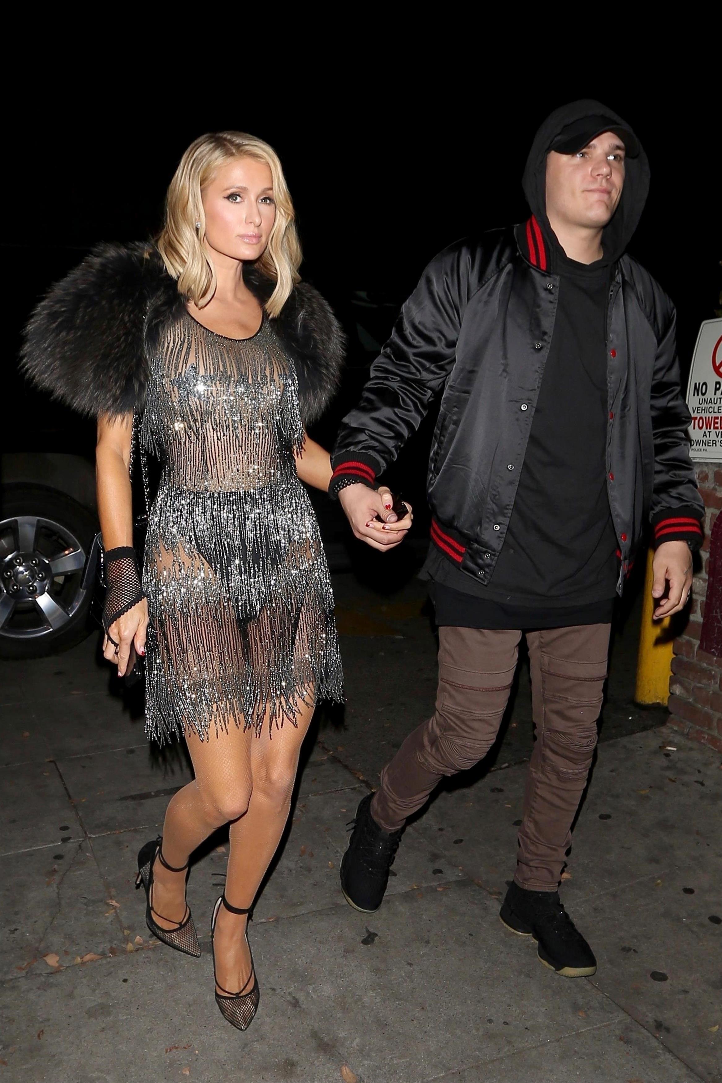 Paris Hilton and Chris Zylka arrive at Delilah for date night