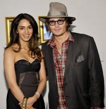 2009__11__johnnymallika 218&#215;224.jpg