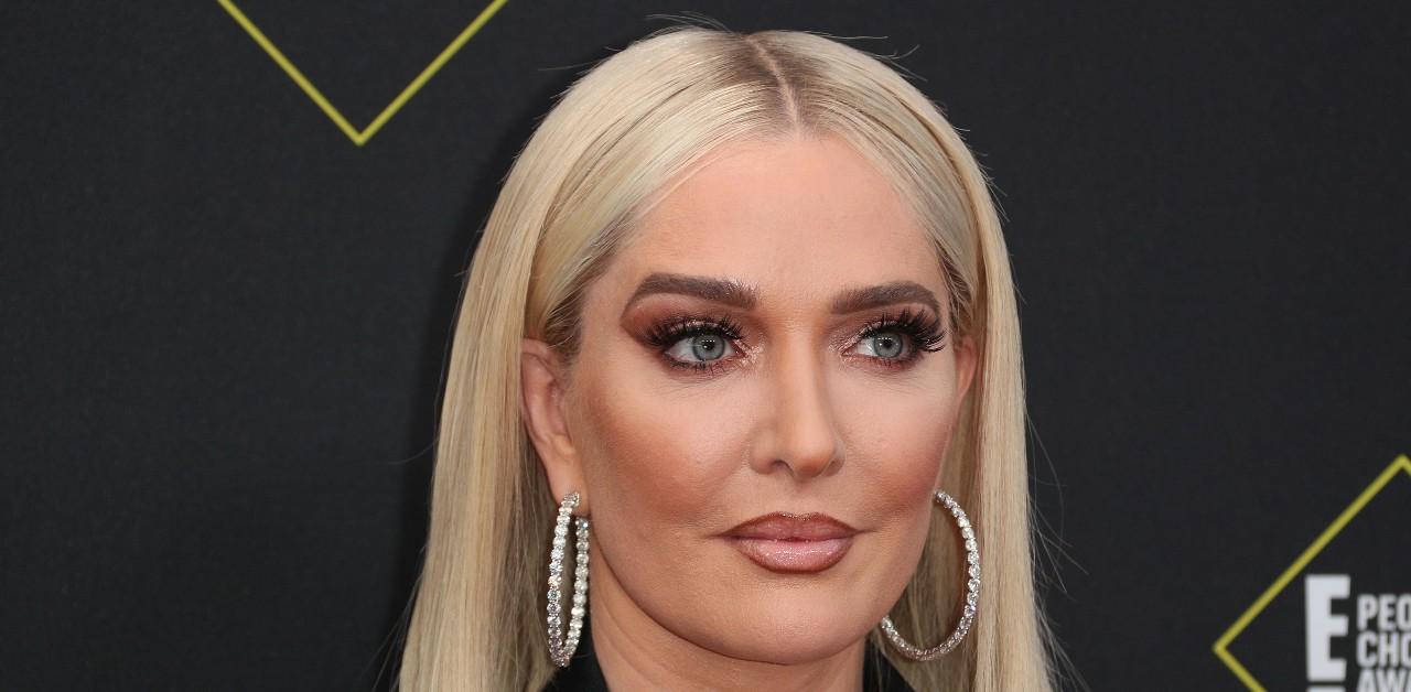 Erika Jayne lugs her own groceries amid financial woes