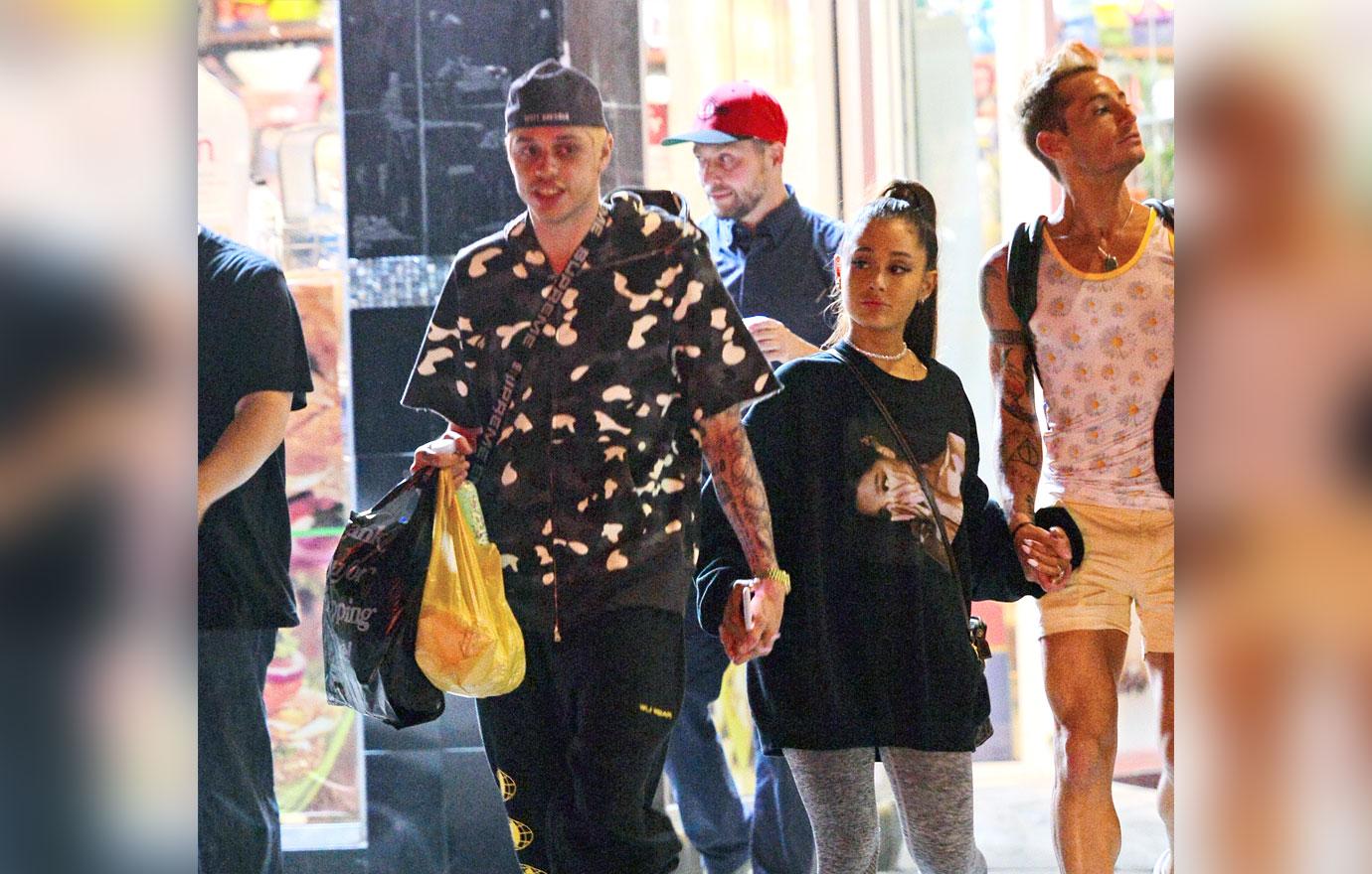 EXCLUSIVE: Ariana Grande and Pete Davidson are all smiles as they step out hand in hand in NYC