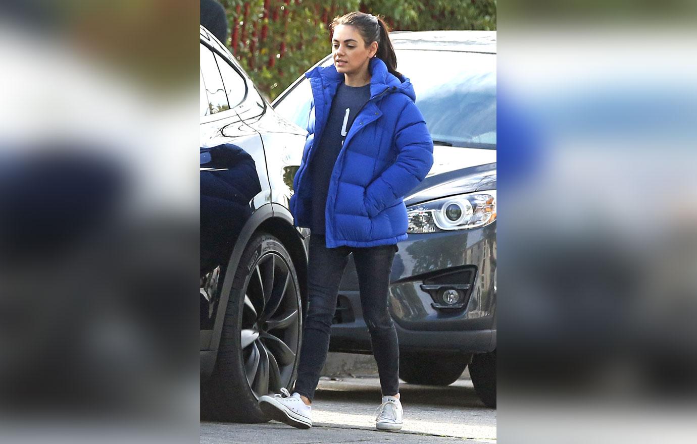 EXCLUSIVE: Mila Kunis all wrapped up for the chilly weather in LA