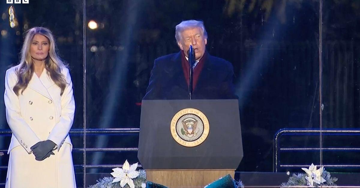 image of Donald Trump applauded his wife for lighting up the National Christmas Tree.