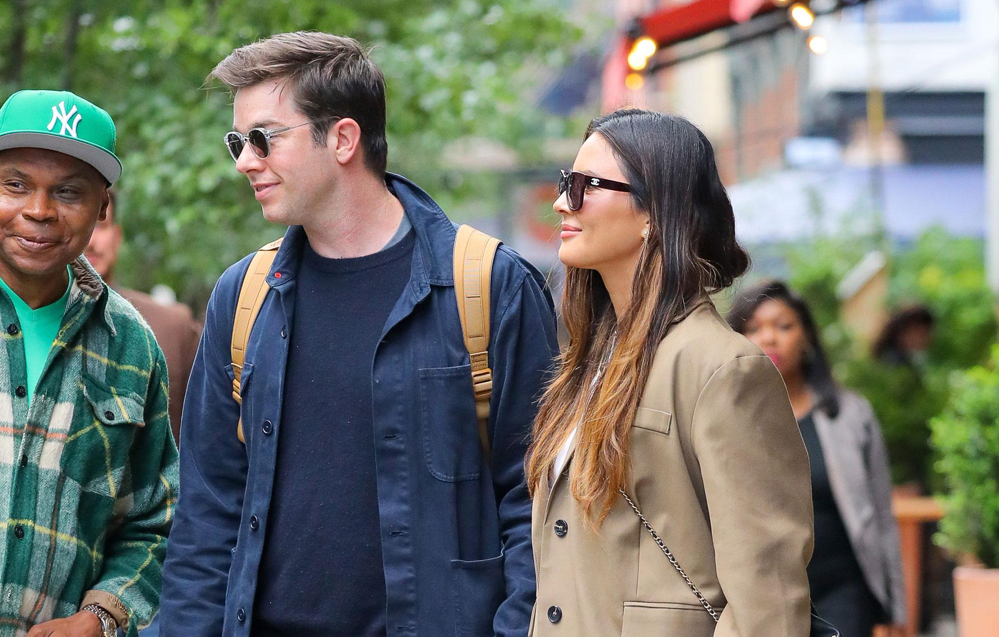 olivia munn and john mulaney seen holding hands as leaving their hotel in new york city