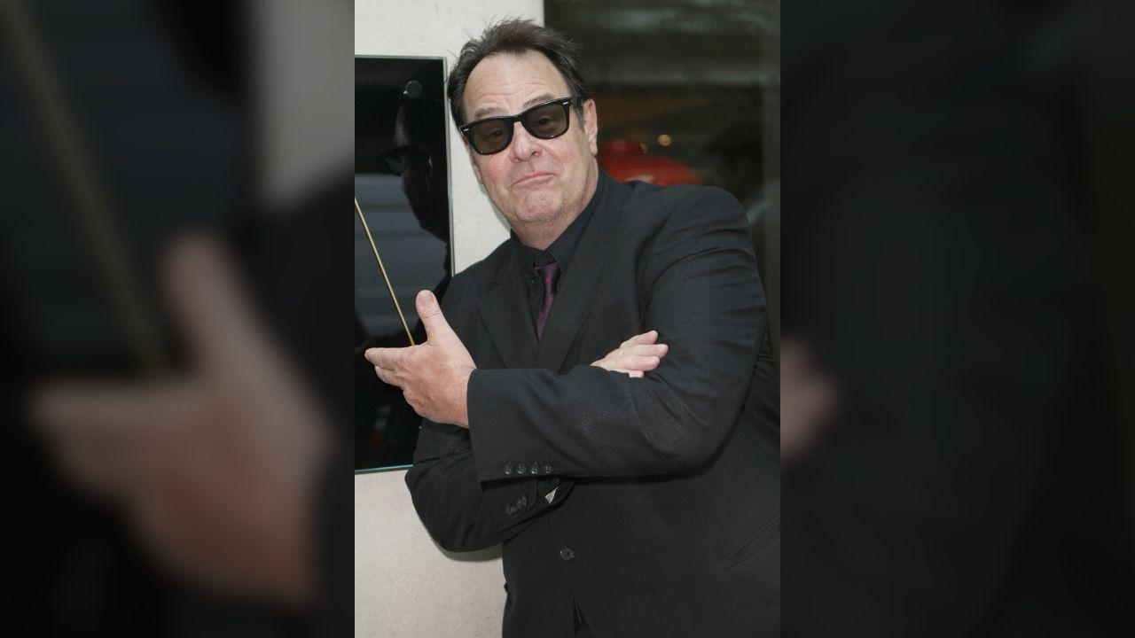 Image of Dan Aykroyd contrasted his quiet Canadian life with what he called the 'medieval' reality of California.