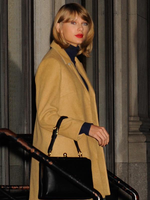 Taylor Swift leaves her Tribeca apartment after meeting with Jay Z and Justin Timberlake