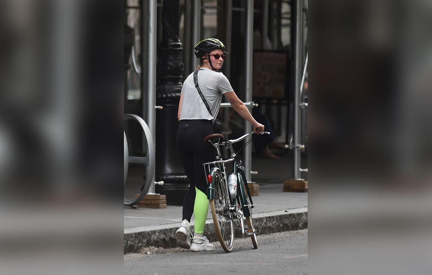 sophie turner riding her bike