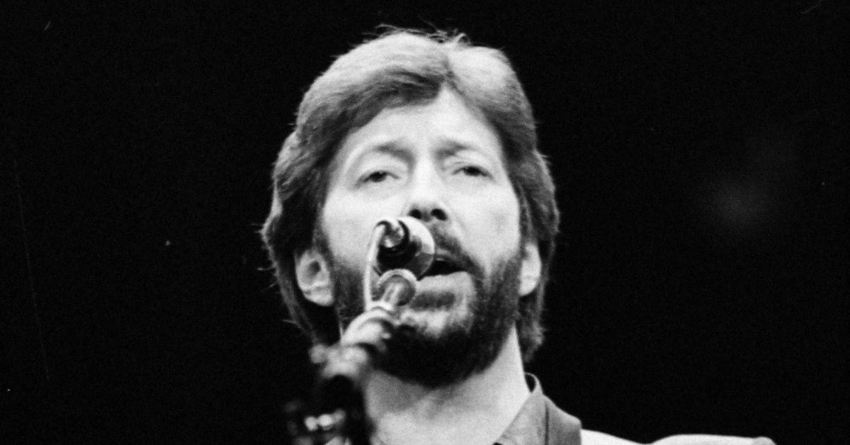 image of Eric Clapton abruptly ended his concert in Madrid after an audience member reportedly threw a vinyl record that struck the legendary guitarist during his performance.