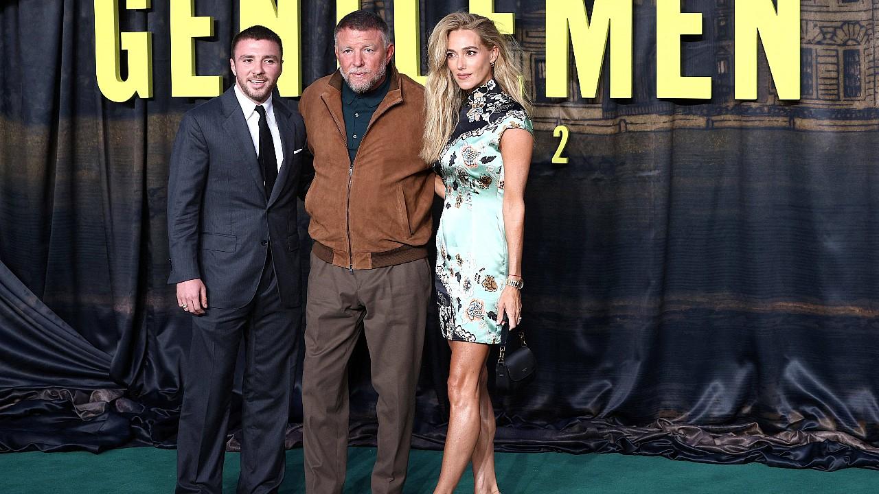 Image of Guy Ritchie was joined by wife Jacqui Ainsley and son Rocco Ritchie for 'The Gentlemen' Season 2 premiere in London.