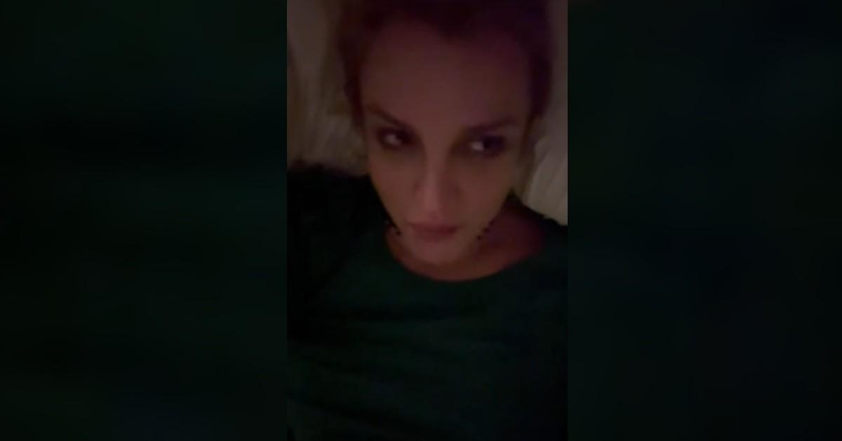 Photo of Britney Spears laying in bed.