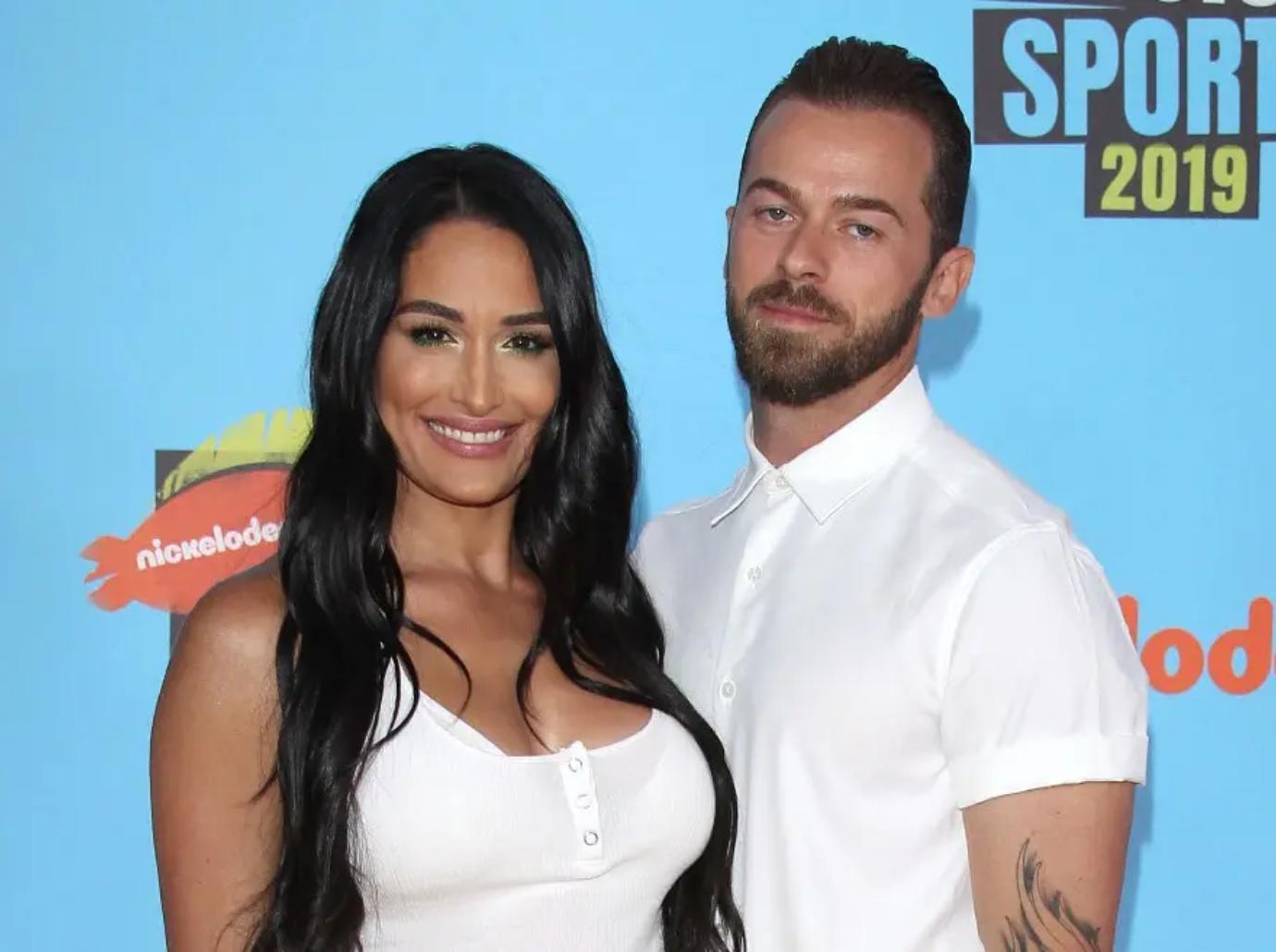 nikki garcia sister brie truth artem chigvintsev charges dropped