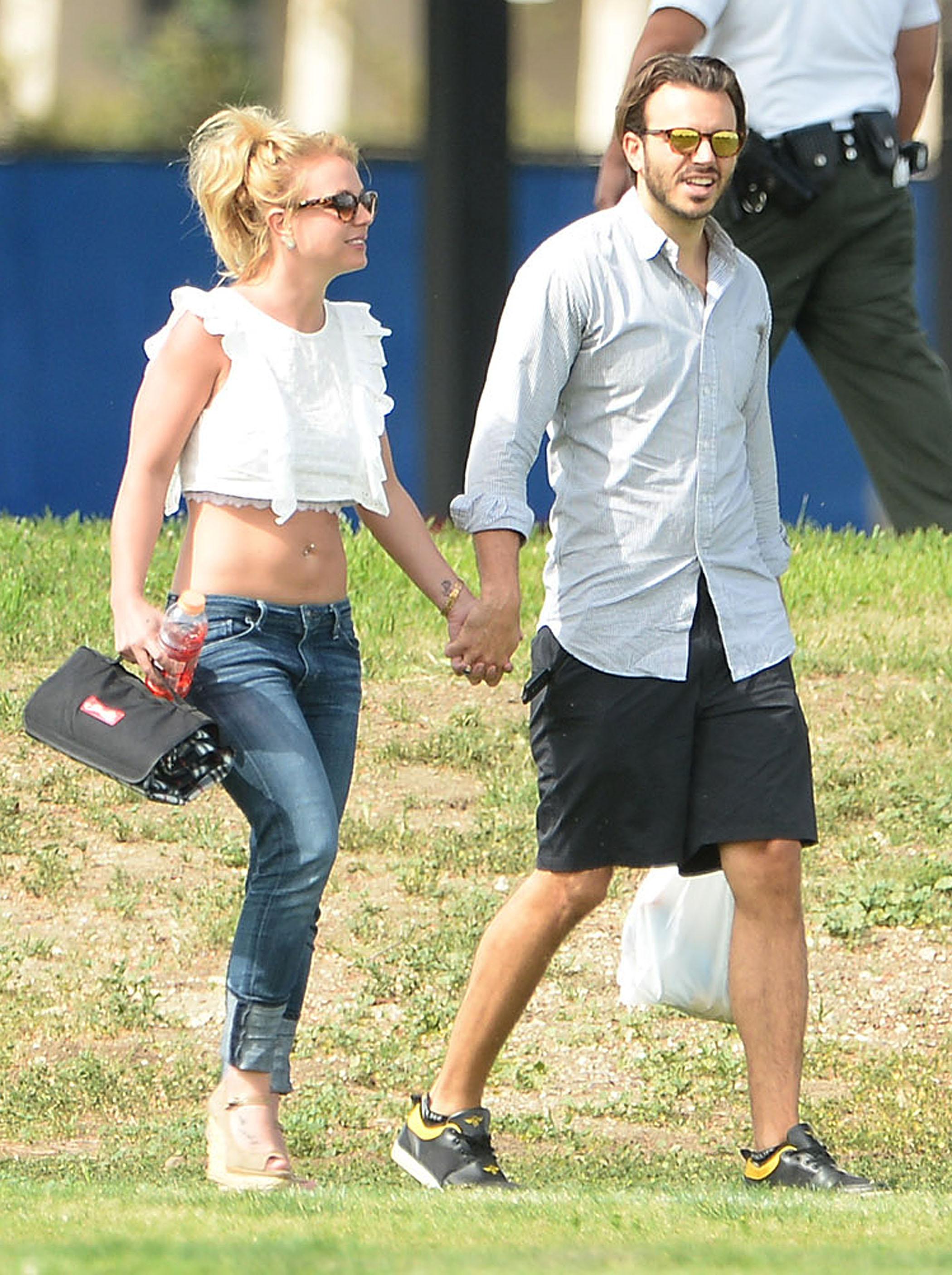 ***NO DAILY MAIL SALES***Britney Spears showing off her amazing body while watching her boys soccer game along with boyfriend, Charlie Ebersol