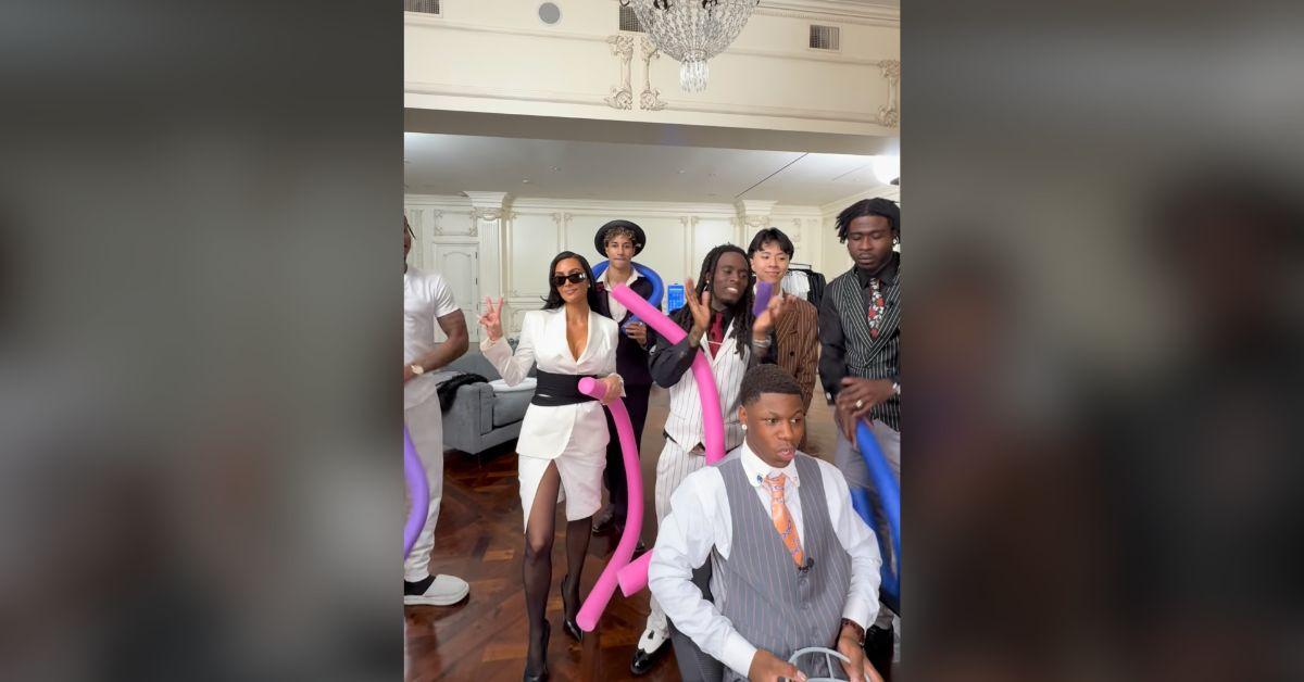 Image of Kim Kardashian let out her anger with a pool noodle.