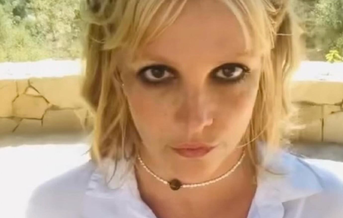 britney spears concern posting deleting racy photo cleavage she ok