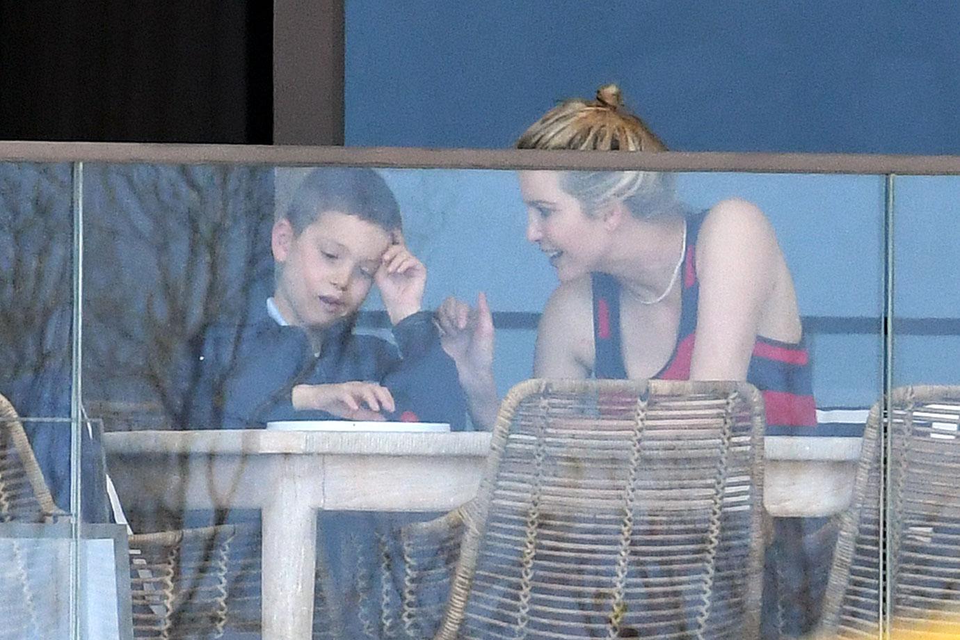 ivanka trump red and black striped dress lunch with son balcony miami