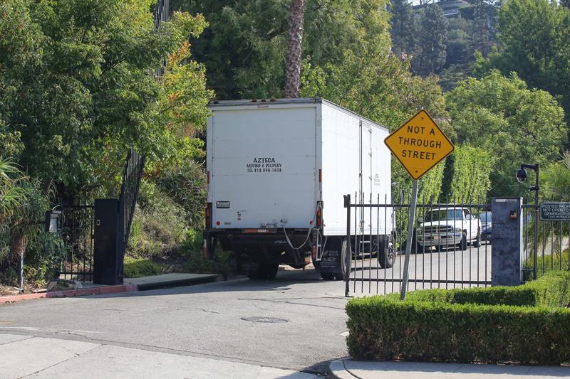 Moving Trucks at Brad Pitt&#8217;s Home