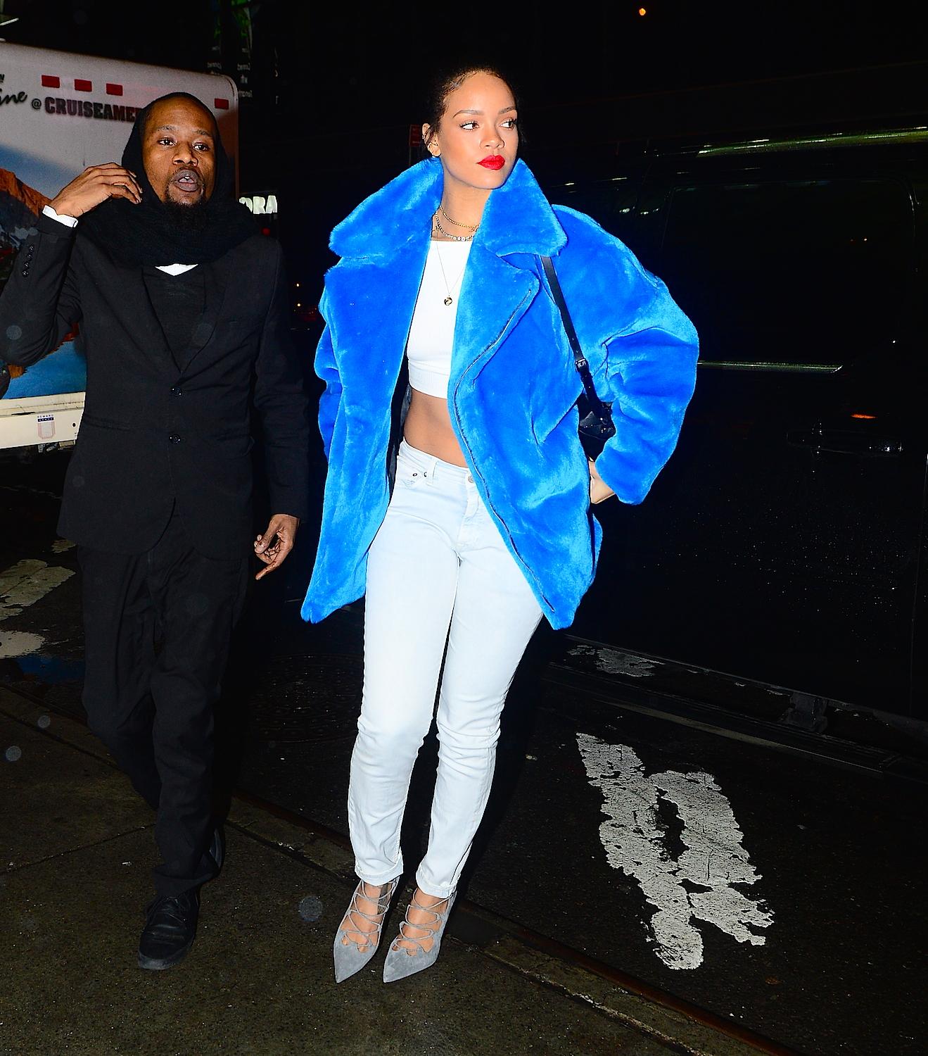 Rihanna looks stunning in a blue jacket in Times Square