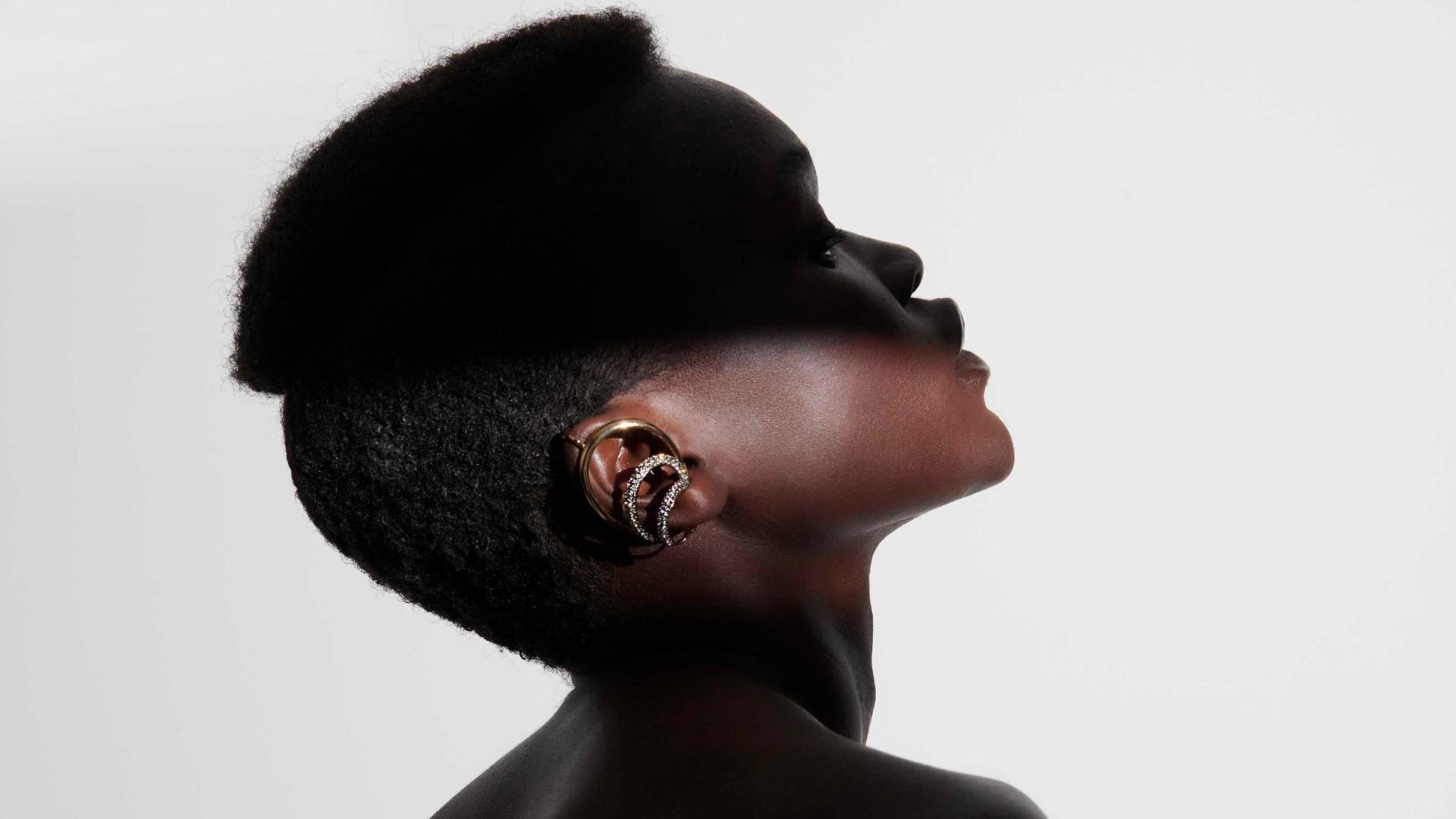 Photo of a woman wearing a Raisa Cuff.
