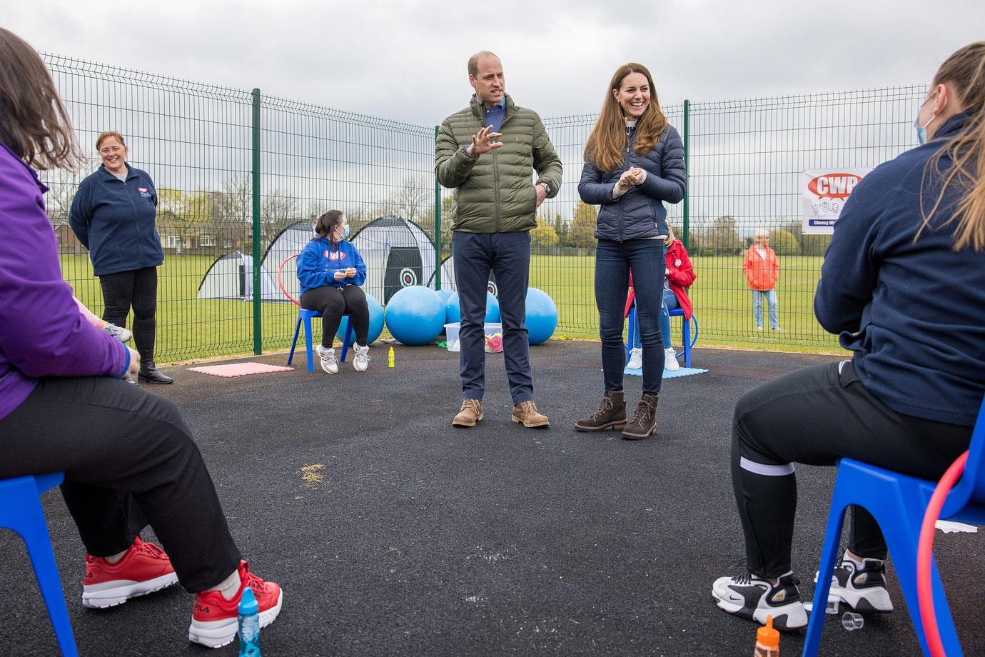 prince william and duchess catherine meet people at charity event