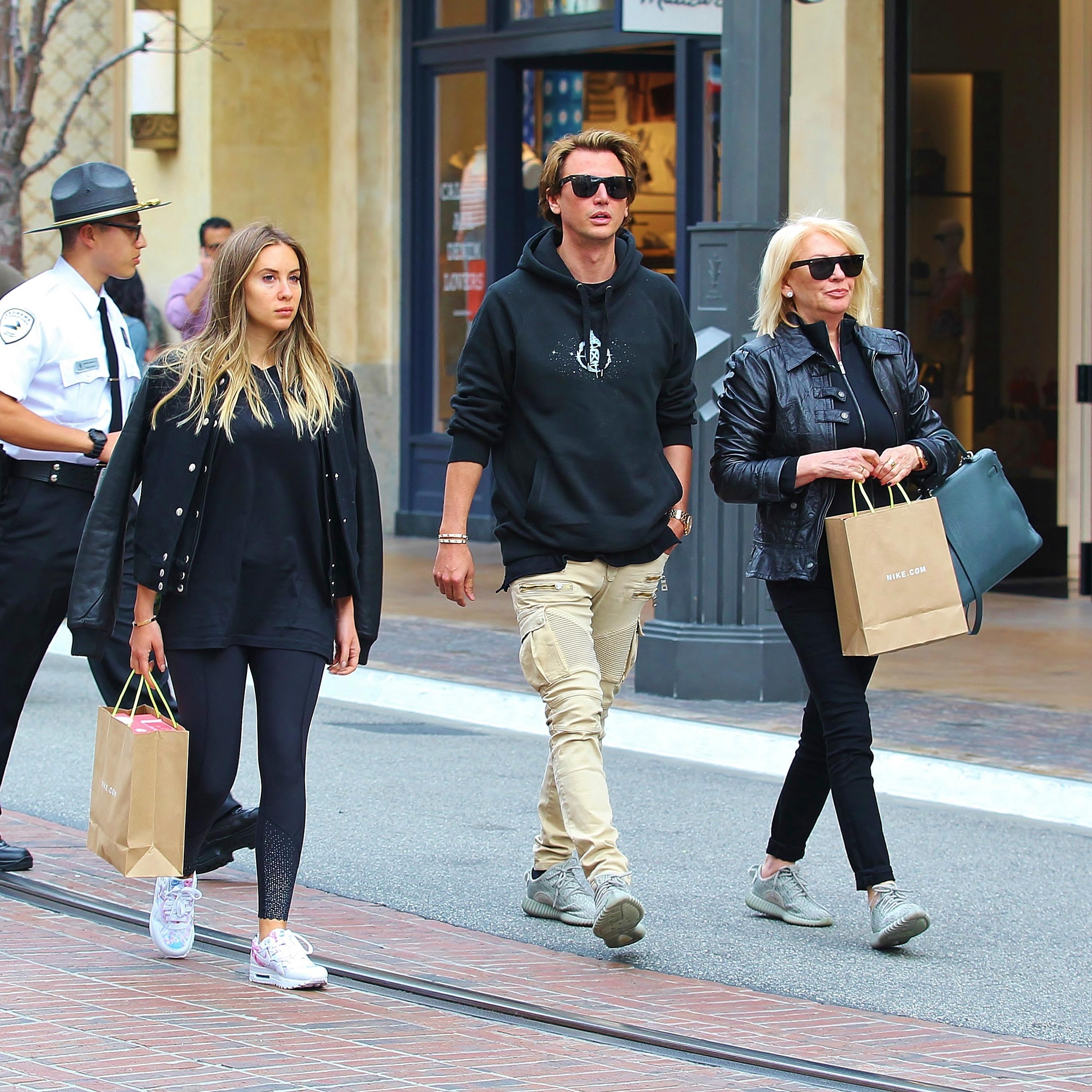 EXCLUSIVE: Jonathan Cheban and his mother wearing Adidas Yeezy 350 Boost whilst shopping at Nike Store in West Hollywood, California