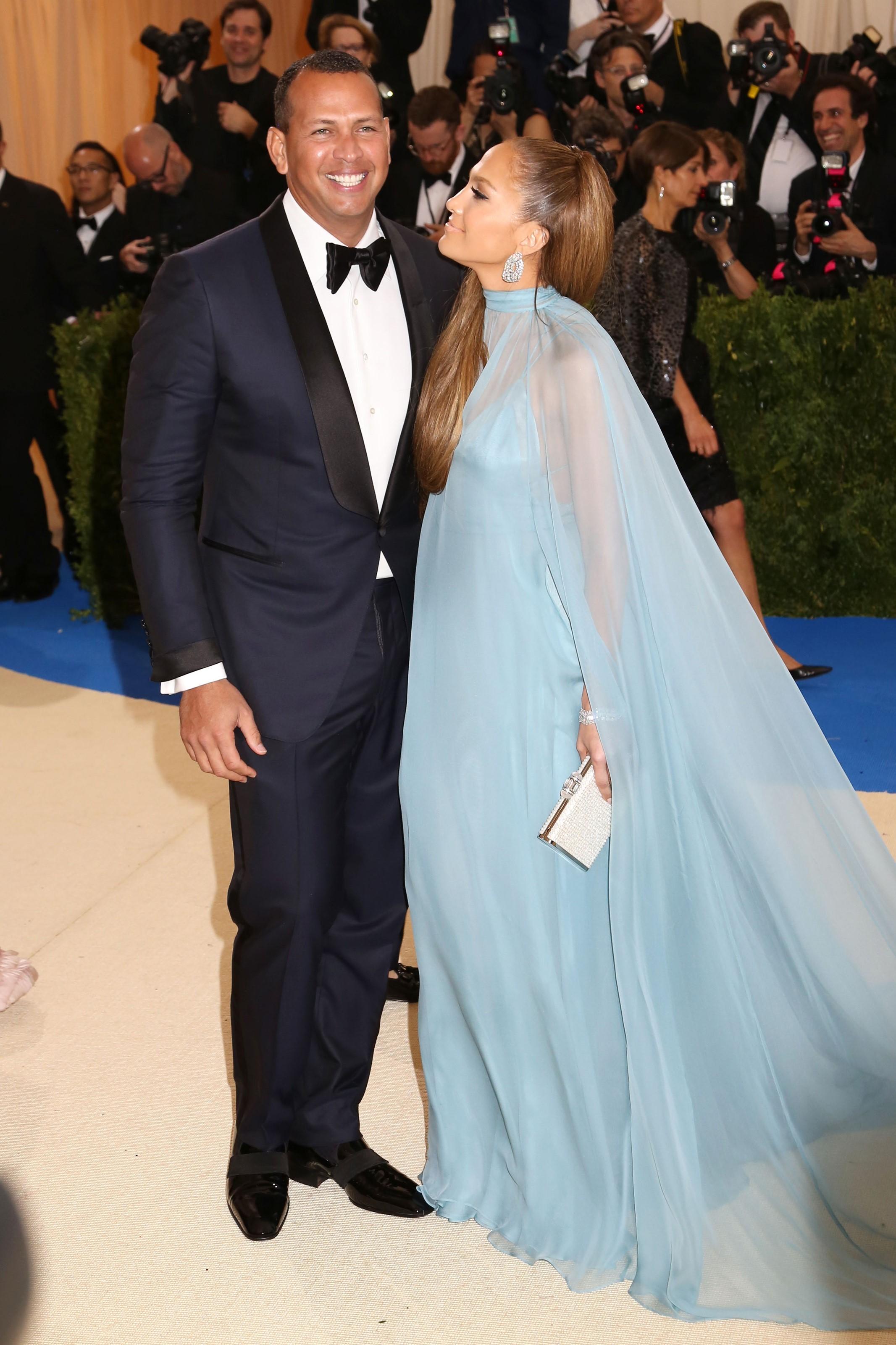 Alex Rodriguez and Jennifer Lopez pose together at the 2017 Met Gala