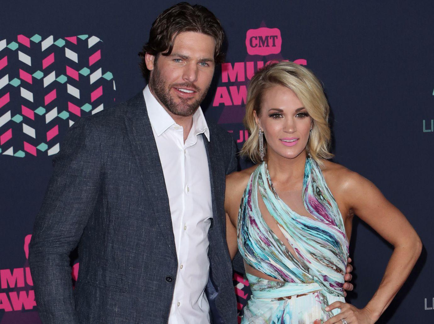 carrie underwood mike fisher prioritize marriage frustrated