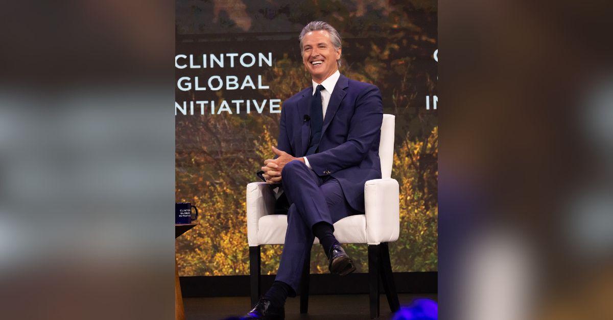 image of Gavin Newsom tends to cross his legs when he sits.