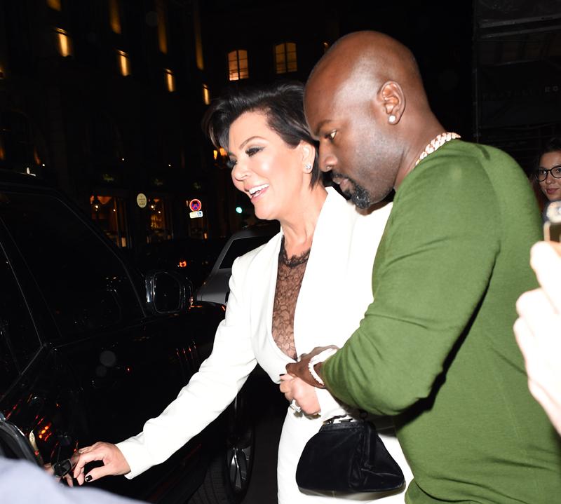 Kris Jenner looks worst for wear as she is helped to her waiting car by Corey Gamble after a 4 hour bender at the Costes Restuarnt in Paris.