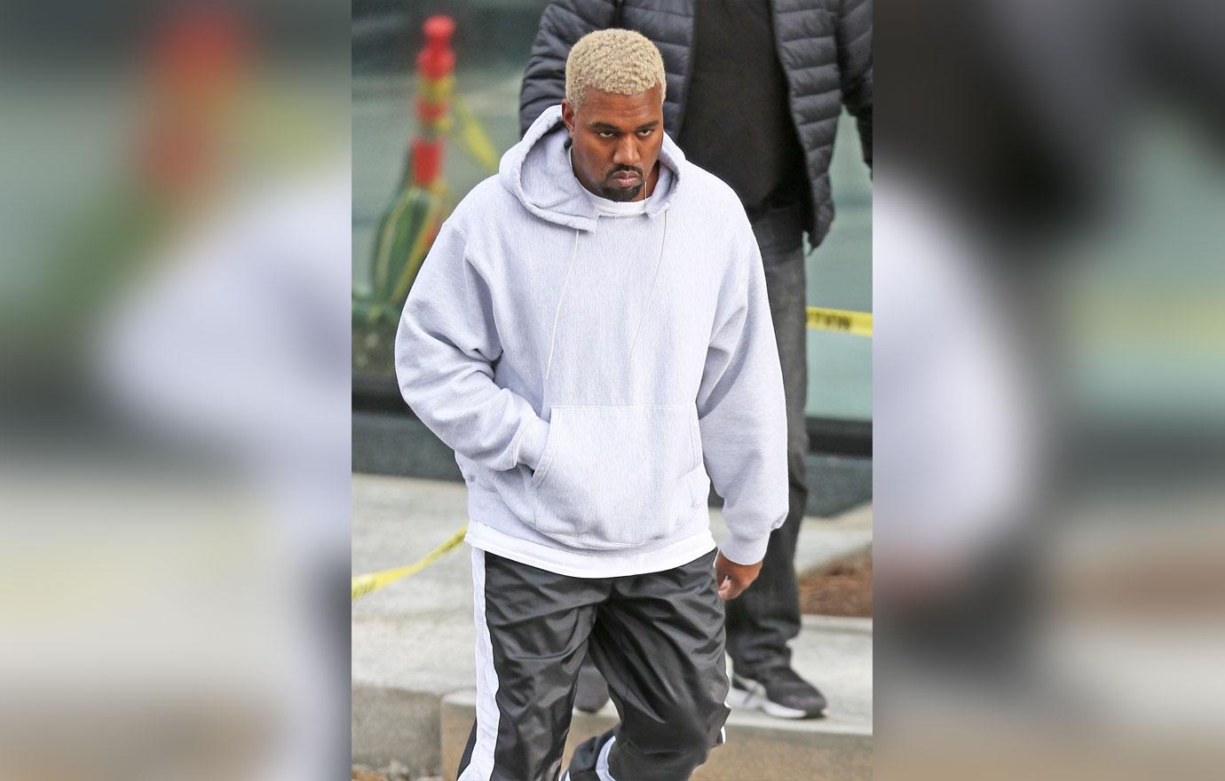 Kanye West makes a quick stop at the office