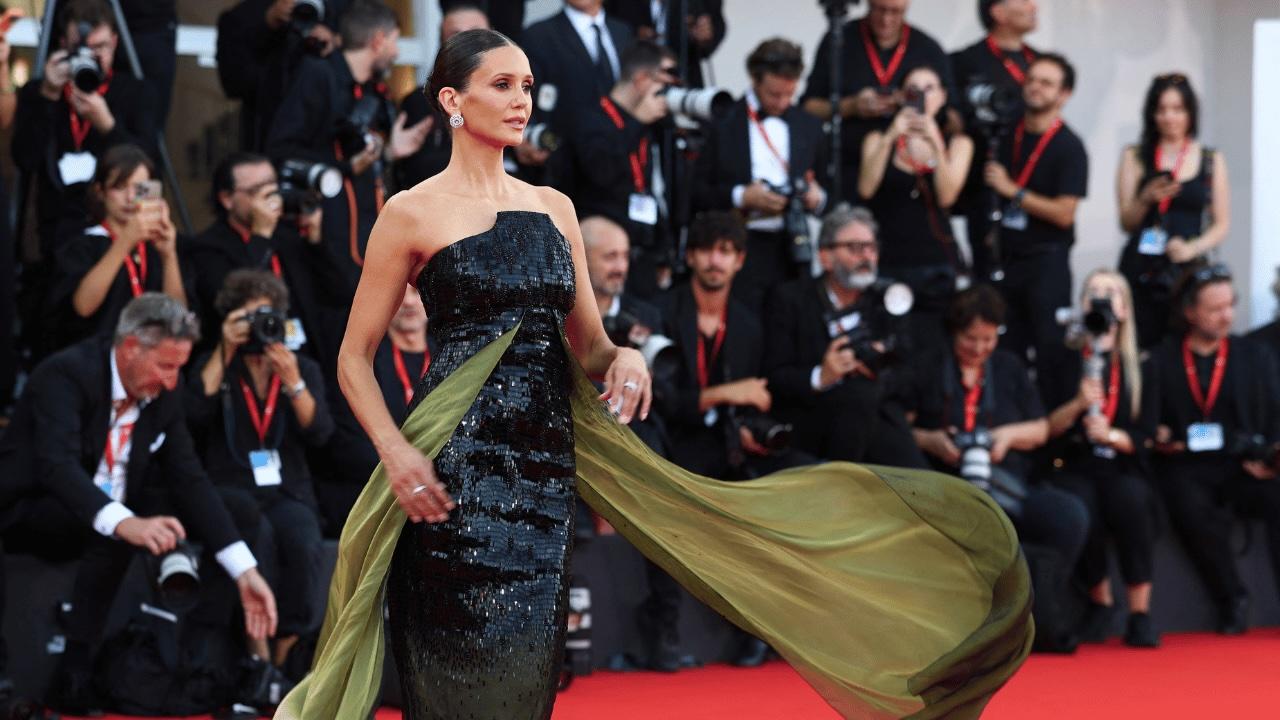 Photo of Nina Dobrev was approached multiple times by ushers while on the red carpet.