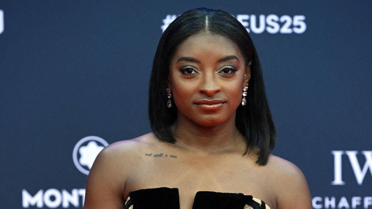 Image of Simone Biles defended her friendship with Taylor Swift after attending the singer's wedding with Jonathan Owens.