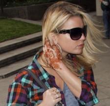 2009__10__jesstattmainhoriz 225×217.jpg