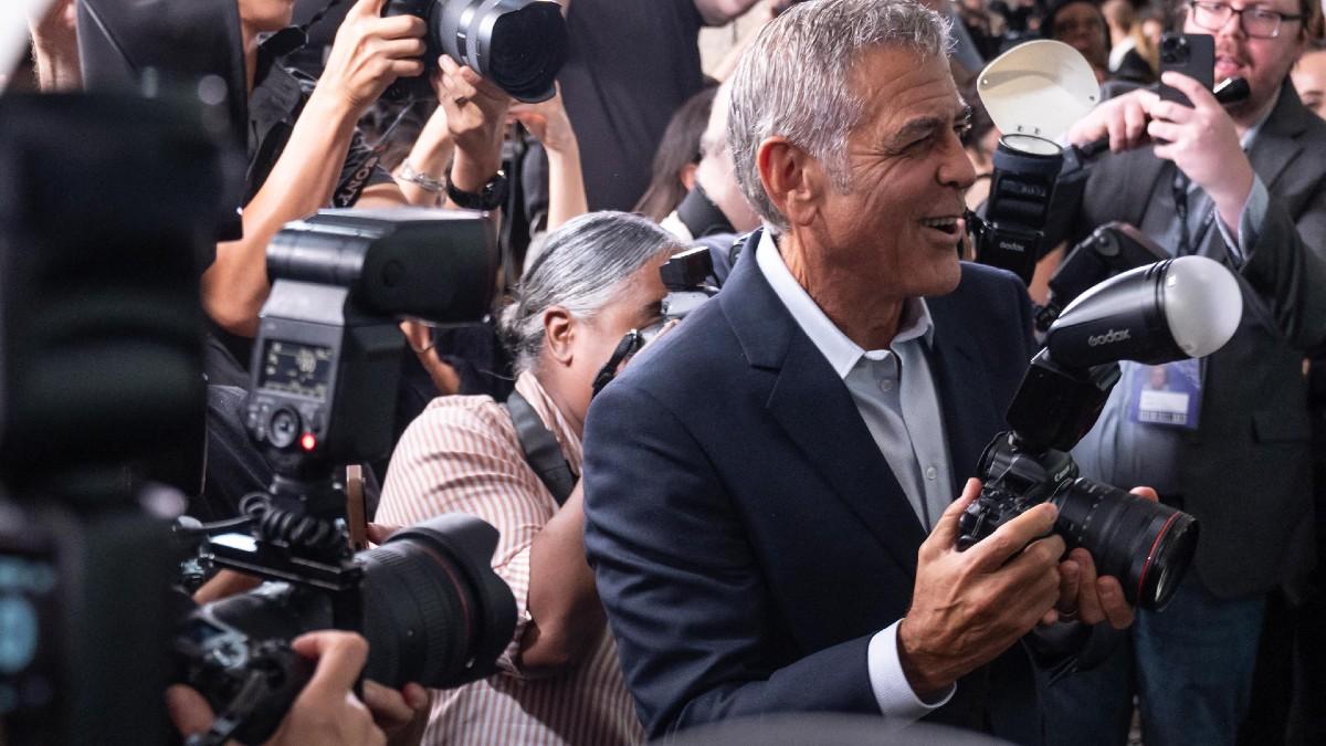 image of George Clooney said he has 'faith in the press.' 
