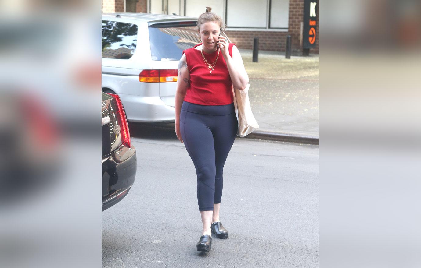 Lena Dunham in red tank top